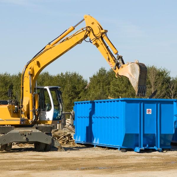 large blue dumpster for household cleanouts